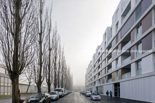 emmi-main office and apartment complex rüssli architekten