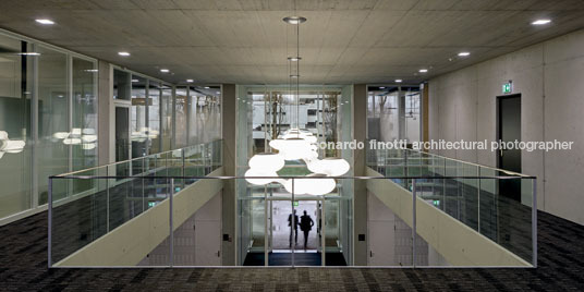 emmi-main office and apartment complex rüssli architekten