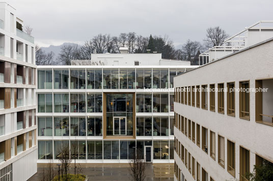 emmi-main office and apartment complex rüssli architekten